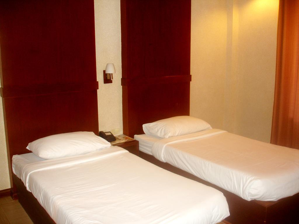 Roxas Midtown Hotel Ruang foto