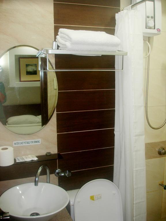 Roxas Midtown Hotel Ruang foto