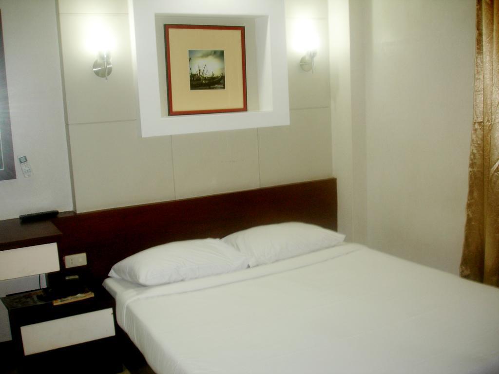Roxas Midtown Hotel Ruang foto