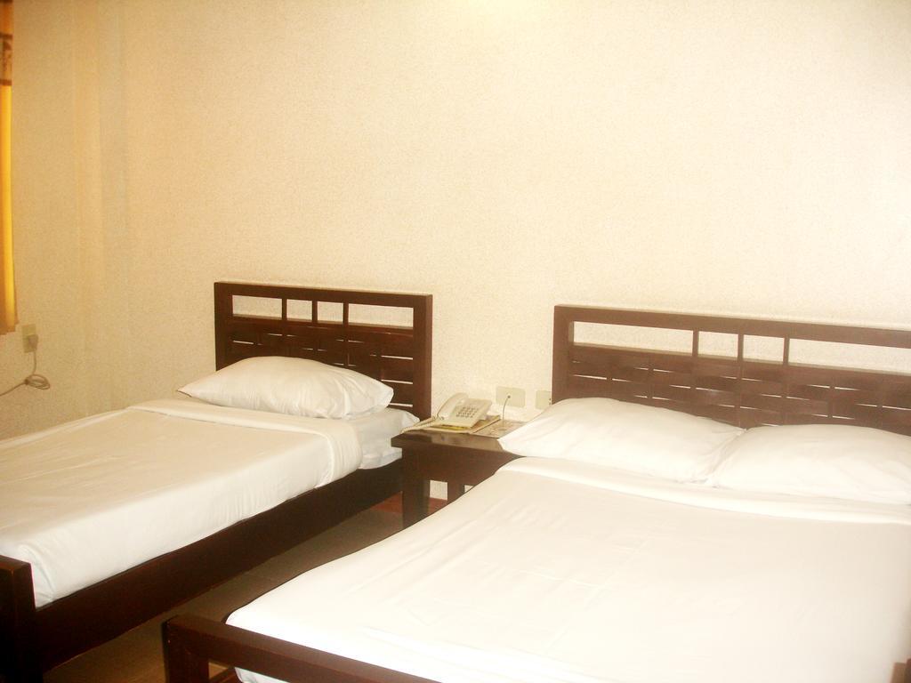 Roxas Midtown Hotel Ruang foto