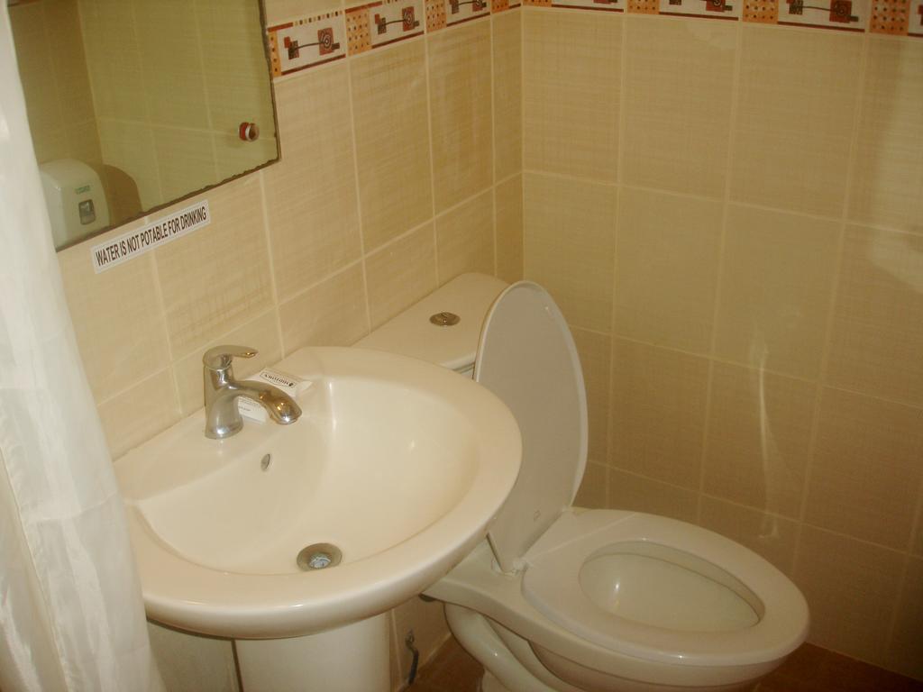 Roxas Midtown Hotel Ruang foto
