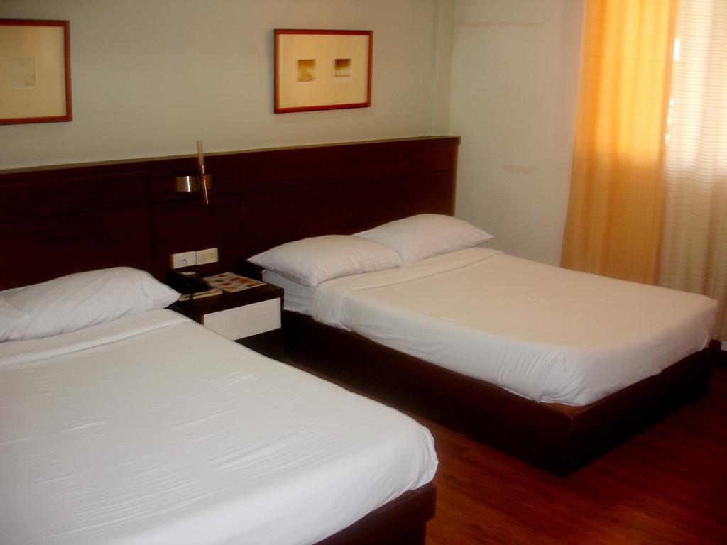 Roxas Midtown Hotel Ruang foto