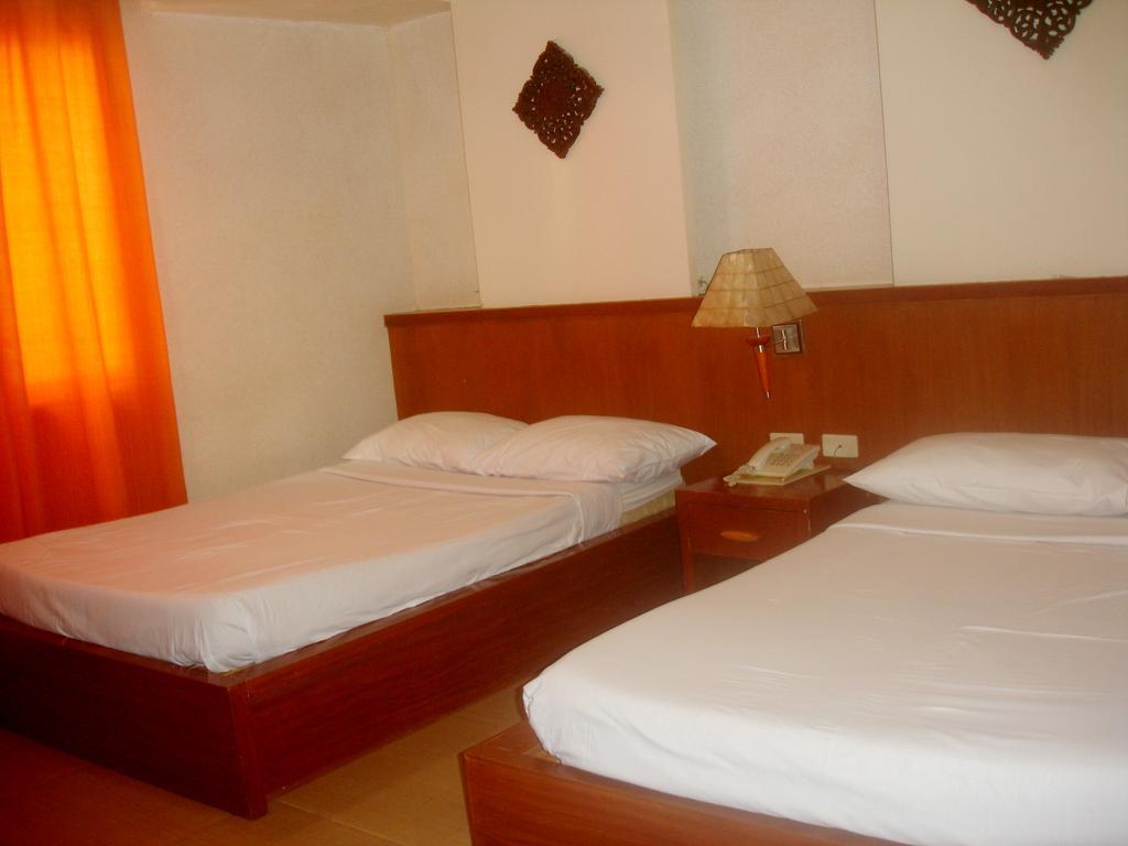 Roxas Midtown Hotel Ruang foto