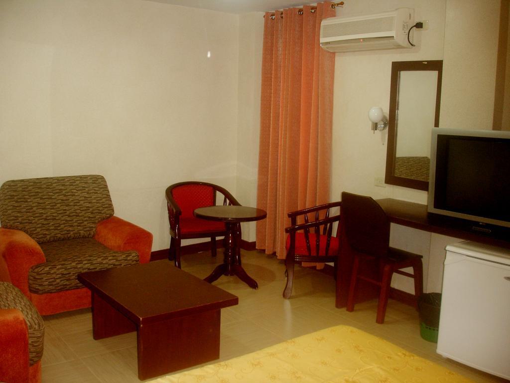 Roxas Midtown Hotel Ruang foto